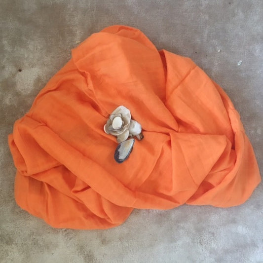 Bright orange summer swaddle